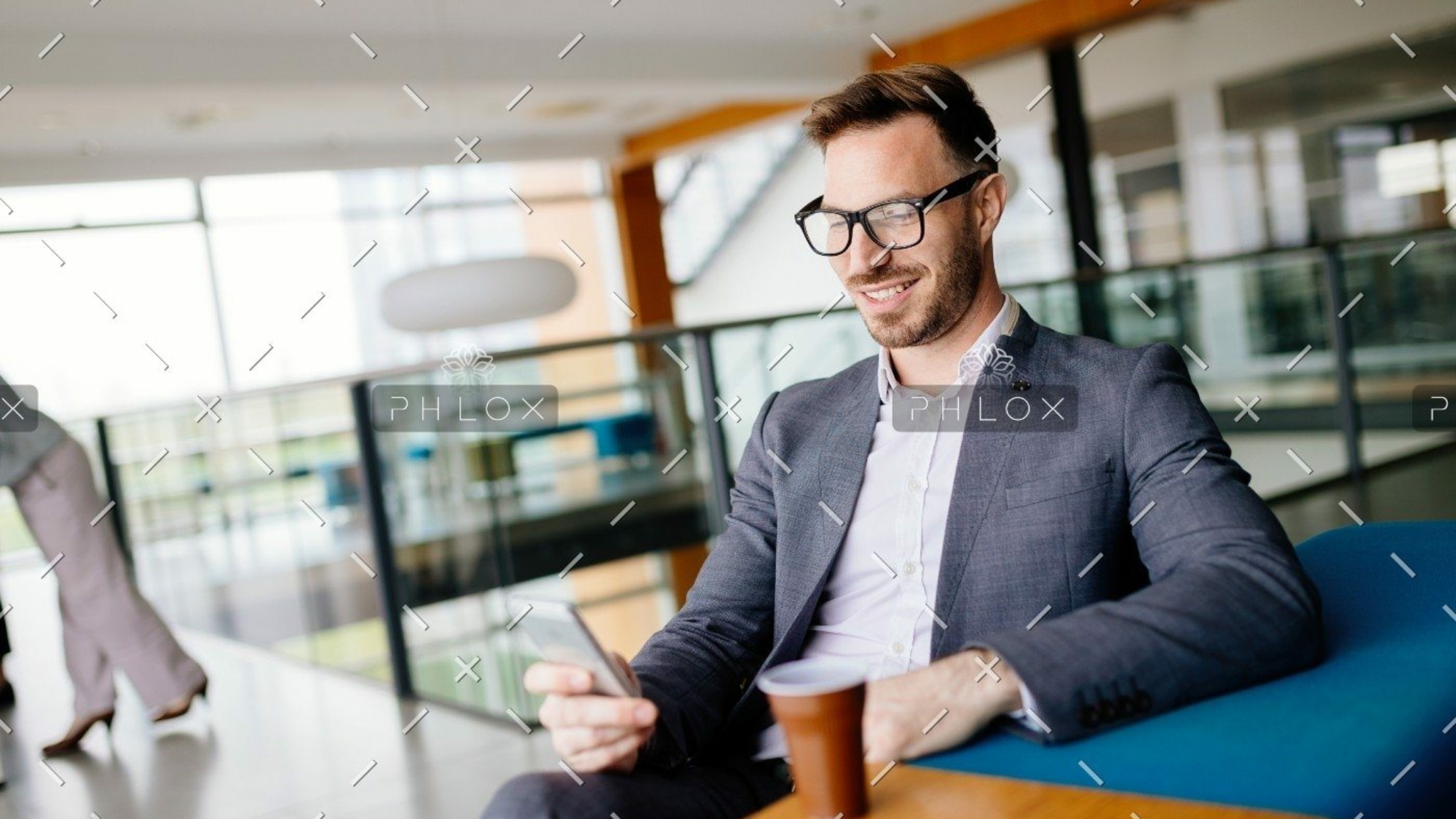 demo-attachment-437-businessman-taking-a-break-with-a-cup-of-coffee-JW4B3DH